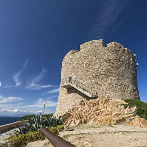 View of Longosardo Tower and the old cannon surrounded by sea Santa Teresa di Gallura
