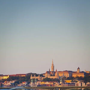 View along the River Danube towards Buda Hill & the Martyas Church illuminated