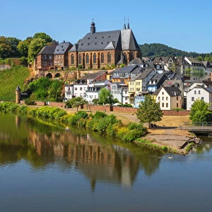 View at Saarburg with church St. Laurentius, river Saar and river Leuk