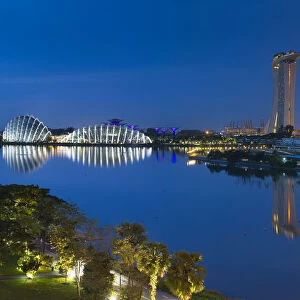 View of Singapore Flyer, Gardens by the Bay and Marina Bay Sands Hotel at dawn, Singapore