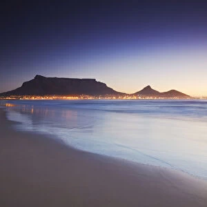 View of Table Mountain at sunset from Milnerton beach, Cape Town, Western Cape, South