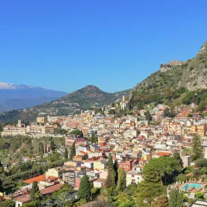 View of Taormina and mount Etna in the distance, Taormina, Sicily, Italy