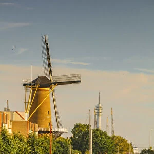 View of Wind Korenmolen de Distilleerketel mill and Delfshaven in Rotterdam