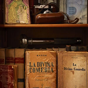 Detail of vintage books of the "Divine Commedy"inside an old office of the Palacio Barolo, Monserrat, Buenos Aires, Argentina. (PR)