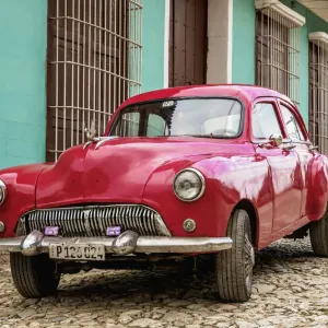 Vintage car on a cobbled street of Trinidad, Sancti Spiritus Province, Cuba Vintage car on a cobbled street of Trinidad, Sancti Spiritus Province, Cuba