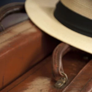 Vintage Leather Suitcase with Panama Hat