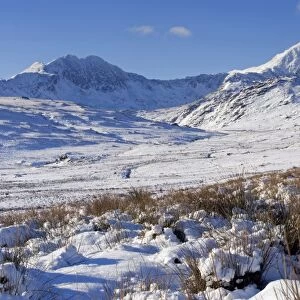 Wales, Gwynedd, Snowdonia. View over the frozen landscape towards the Snowdon Horseshoe