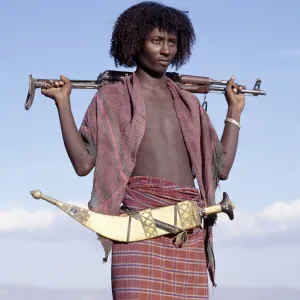 Warriors of the nomadic Afar tribe wear their hair