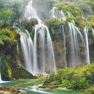 Waterfall in autumnal deciduous forest - Croatia, Lika-Senj