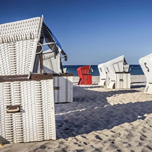 White and red beach chairs in Boltenhagen, Mecklenburg-Western Pomerania