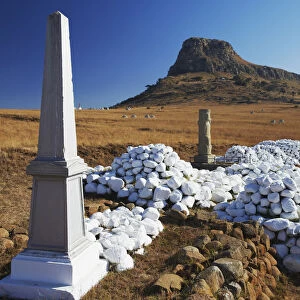 White stone cairns and memorials to British soldiers at Isandlwana, Thukela, KwaZulu-Natal