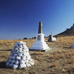 White stone cairns and memorials to British soldiers at Isandlwana, Thukela, KwaZulu-Natal