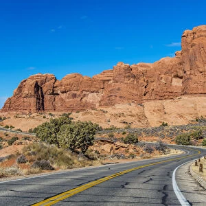 Winding road in a desert landscape, Arches National Park, Utah, USA