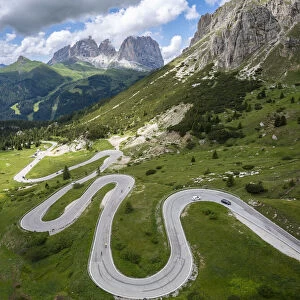 winding road of the Pordoi Pass during a summer day. Fassa Valley, Dolomiti, Canazei