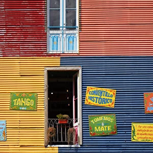 Windows of a colorful bar in the "Caminito de La Boca"with wall decorations in "Fileteado Art", Buenos Aires, Argentina