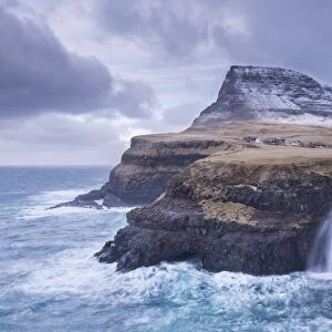 Wintry conditions at Gasadalur on the island of Vagar, Faroe Islands, Denmark, Europe