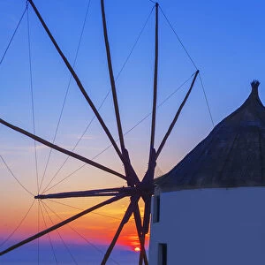 Wndmill at sunset, Oia, Santorini, Cyclades Islands, Greece