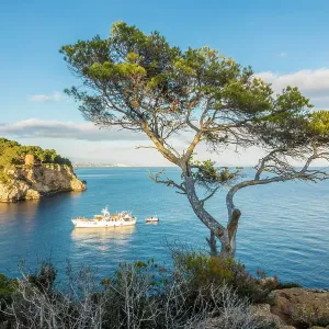 Yacht at the entrance to Cala Portals Vells, Mallorca, Balearic Islands, Spain Yacht at the entrance to Cala Portals Vells, Mallorca, Balearic Islands, Spain