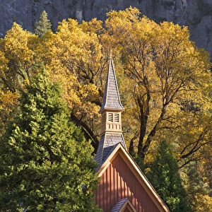 Yosemite Chapel surrounded by fall foliage, Yosemite Valley, California, USA. Autumn