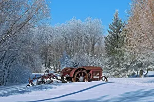 Industry Prints: 1937 McCormick Deering tractor with plough in a field surrounded by trees covered by heavy hoarfrost Near Deacon's