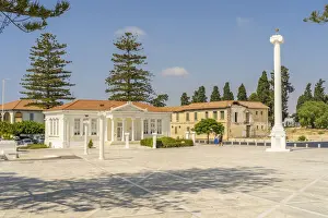 Chris Mouyiaris Prints: 28th of October Column and the Paphos Municipal Library in 28th of October Square, Paphos