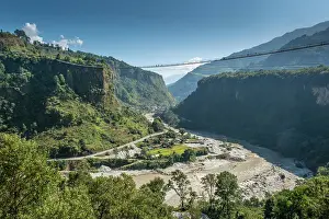 Suspension Bridge Prints: The 567 metre Ghandaki Golden Bridge suspended walkway over the Kali Gandaki river