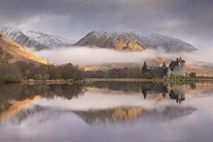 Serene Collection: The abandoned ruin of Kilchurn Castle on a misty winter morning, Loch Awe, Argyll & Bute, Scotland