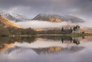 The abandoned ruin of Kilchurn Castle on a misty winter morning, Loch Awe, Argyll & Bute, Scotland