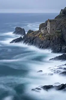 Abandoned ruin of tin mine engine house on the Cornish cliffs near Botallack, Cornwall, England