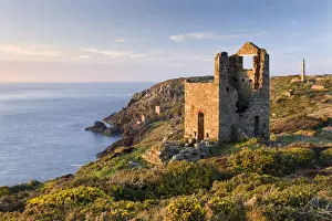 April Prints: Abandoned tin mine engine houses and chimney stacks lie scattered over the clifftops at Botallack