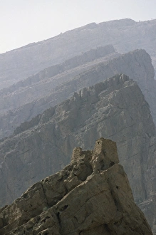 Harsh Prints: An abandoned watchtower perched high on a pinnacle