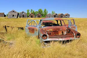 Saskatchewan Collection: Abandonned car and graneries Rosetown Saskatchewan, Canada