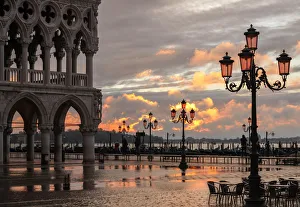 Acqua Alta in St Marks square at sunrise, Venice, Veneto, Italy