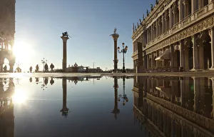 Acqua Alta in St Marks square at sunrise, Venice, Veneto, Italy