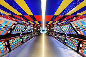 Canary Wharf Prints: The Adam Plaza Bridge, with colourful light installation by Camille Walala