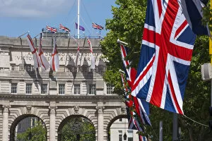 Admiralty Arch & Union Jack flags along The Mall, London, England, UK