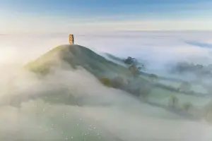 November Prints: Aerial image of Glastonbury Tor emerging from morning mist