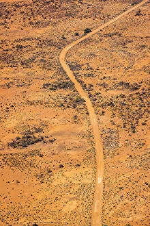 Images Dated 29th August 2023: Aerial of outback dirt road, Menindee Lakes, New South Wales, Australia