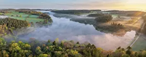 April Prints: Aerial panorama of Kennick Reservoir at dawn on a misty morning in Dartmoor National Park