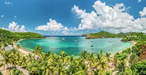 Leeward Islands Prints: Aerial panoramic of the idyllic palm fringed Galleon beach washed by the crystal Caribbean Sea