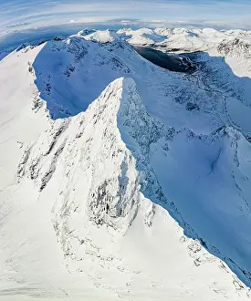 High Up Prints: Aerial panoramic view of Litjemoa mountain peak covered with snow