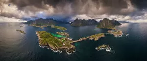 Wind Collection: An aerial panoramic view of the whole Reine fjord on a stormy afternoon. Lofoten Islands, Norway