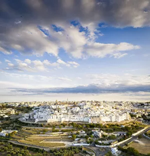 Images Dated 18th May 2021: Aerial panoramic of the white town of Ostuni at sunset, province of Brindisi, Salento
