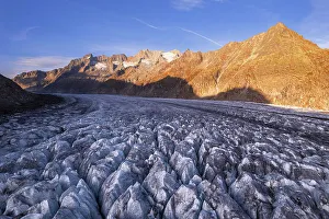 Cracks Prints: Aerial view of the Aletsch glacier and the crevasses at sunset