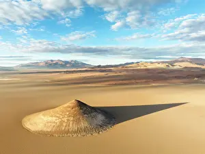 Shadow Prints: Aerial view of the Arita Cone (Cono de Arita) at sunrise in the Arizaro Salt Flat
