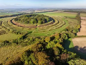 Aerial view of Badbury Rings Iron Age Hillfort near Wimborne, Dorset, England. Autumn (October) 2023