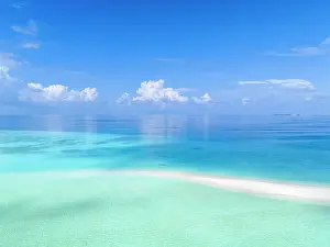 Atoll Prints: Aerial view of a beautiful sandbank on a tropical island in the Indian Ocean