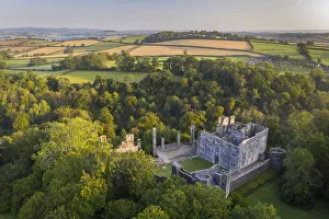 Aerial view of Berry Pomeroy Castle at dawn, Devon, England. Summer (August) 2021