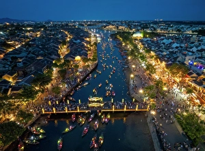 Hoi An Prints: Aerial view of boats on the Thu Bon River at dusk, Hoi An, Central Vietnam