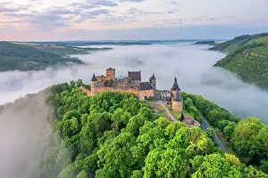 Bourscheid Prints: Aerial view at Bourscheid Castle in the Sauer Valley in morning fog